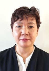 写真：上里佐代委員